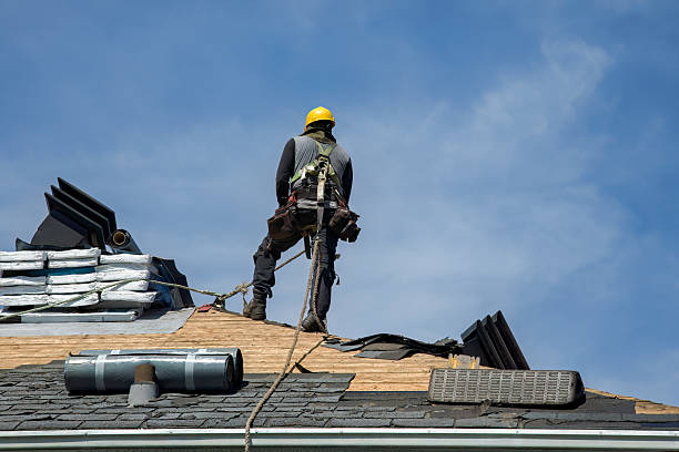 Professional Gutter Installation technician working in Sturbridge, MA